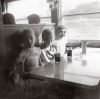 Susan Johnson and unknown girls at diner